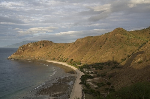 Timor-Leste: Motorcycle, Transportation, Vehicle, Building, House, Housing, Villa, Countryside, Hut, Nature, Outdoors, Rural, Shack, Shelter, Bicycle, Bike, Scooter, Cottage, City, Town, Urban